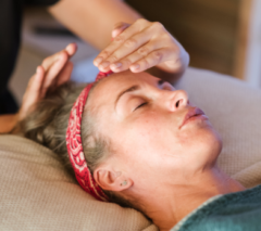 Reiki Healing of a head on table